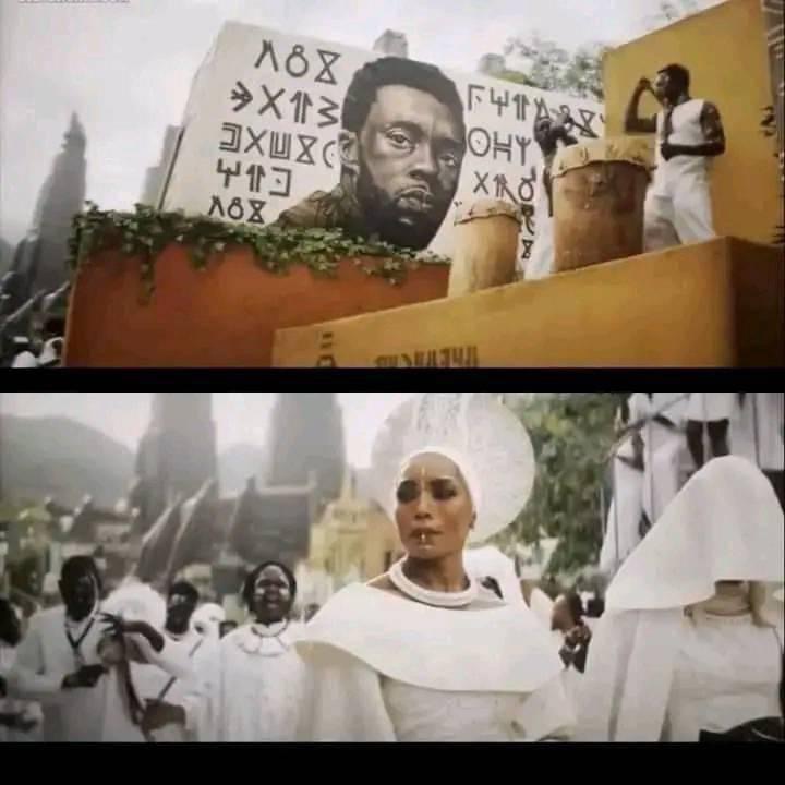 The symbols on the side of the white building in the Black Panther movie is an ancient Nigerian writing script